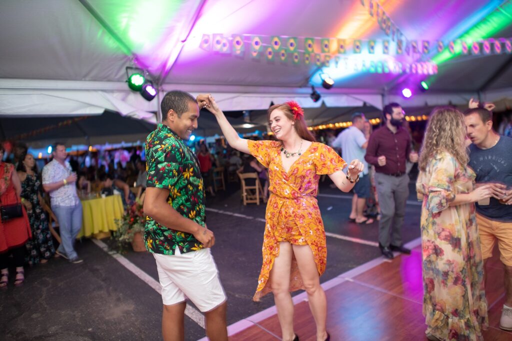 Guests on the dance floor at Night in the Tropics