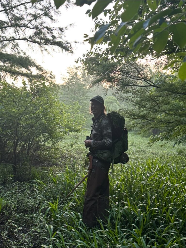 Dr. Latta in the field at dawn